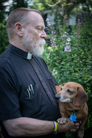 Man of Cloth with Dog of Fur